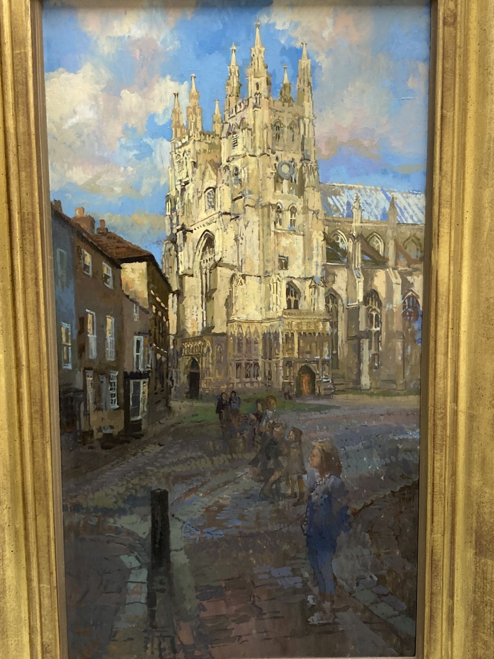 § Peter Kuhfeld (b.1952), oil on board, Children before Canterbury cathedral, 66 x 36cm
